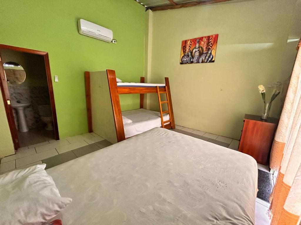 Postel nebo postele na pokoji v ubytování HotelCascol