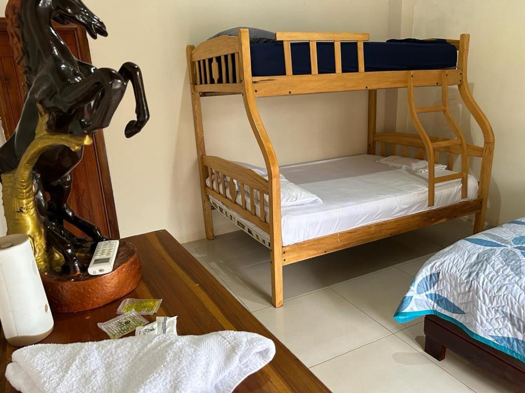 Postel nebo postele na pokoji v ubytování HotelCascol