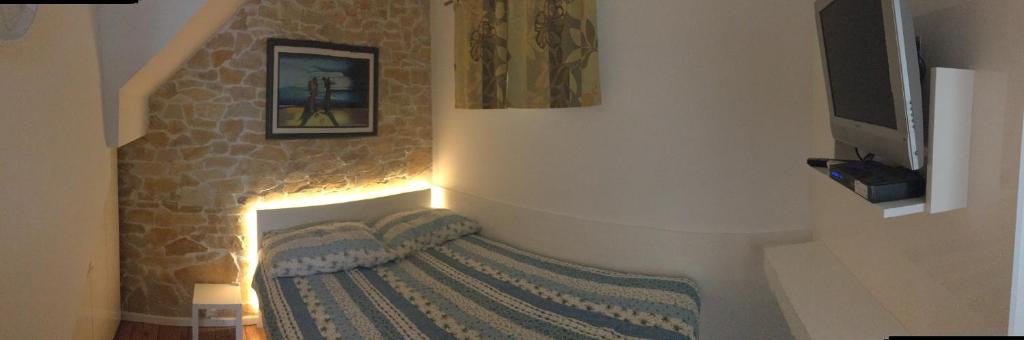 Łóżko lub łóżka w pokoju w obiekcie Apartments Sunny Split