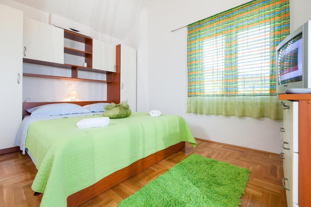 Postel nebo postele na pokoji v ubytování Villa Lora