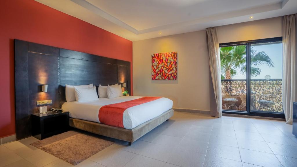 Postel nebo postele na pokoji v ubytování Kech Boutique Hotel & Spa