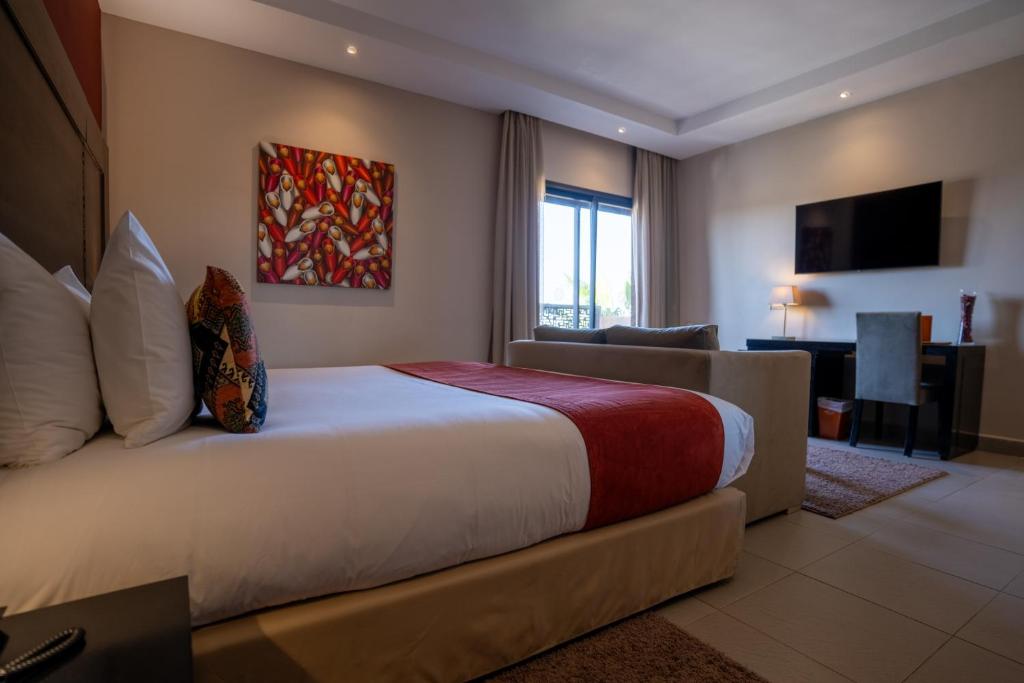 Postel nebo postele na pokoji v ubytování Kech Boutique Hotel & Spa