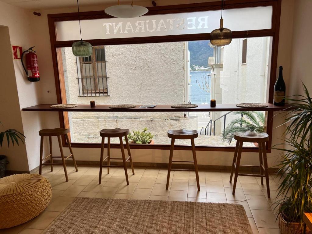 Posezení v ubytování Hostal Sol i Sombra