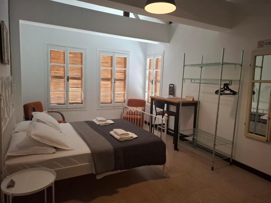 Postel nebo postele na pokoji v ubytování Sabor Residence