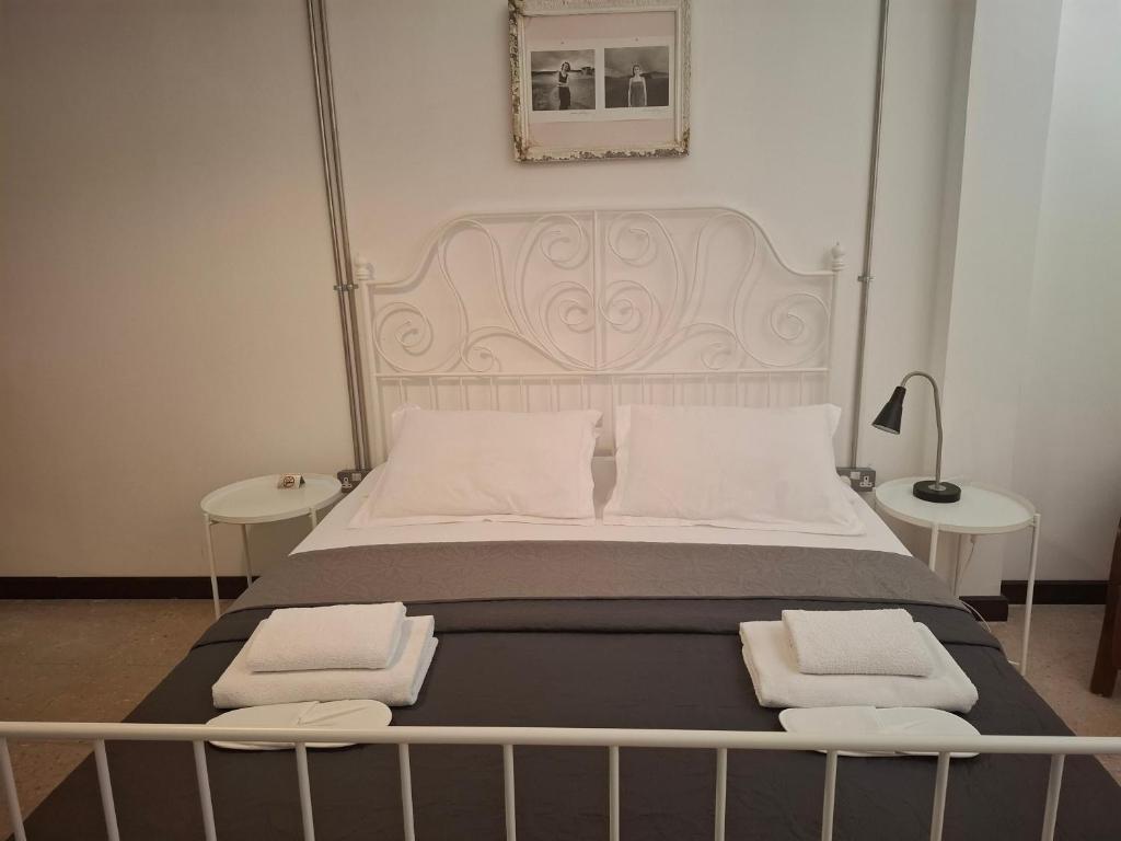 Postel nebo postele na pokoji v ubytování Sabor Residence