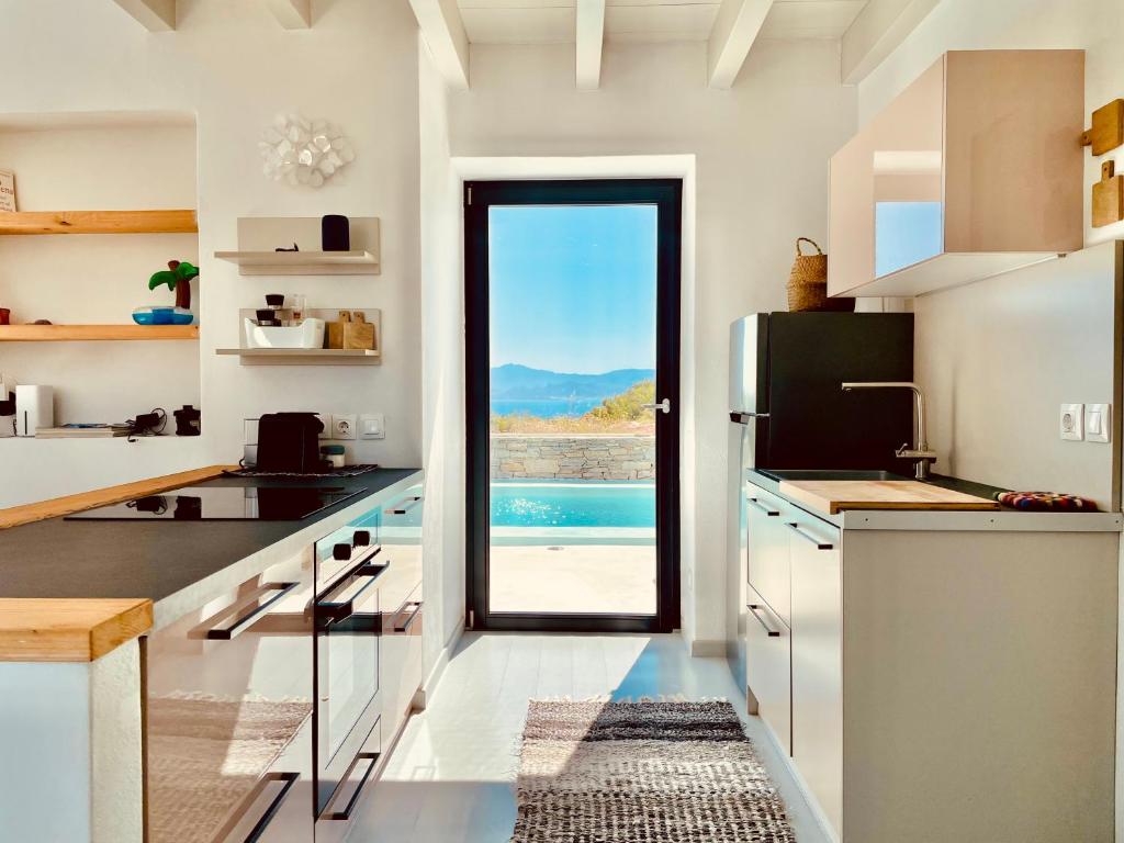 Kuchyň nebo kuchyňský kout v ubytování Spiti su in Paros - Naousa Piscina Privata