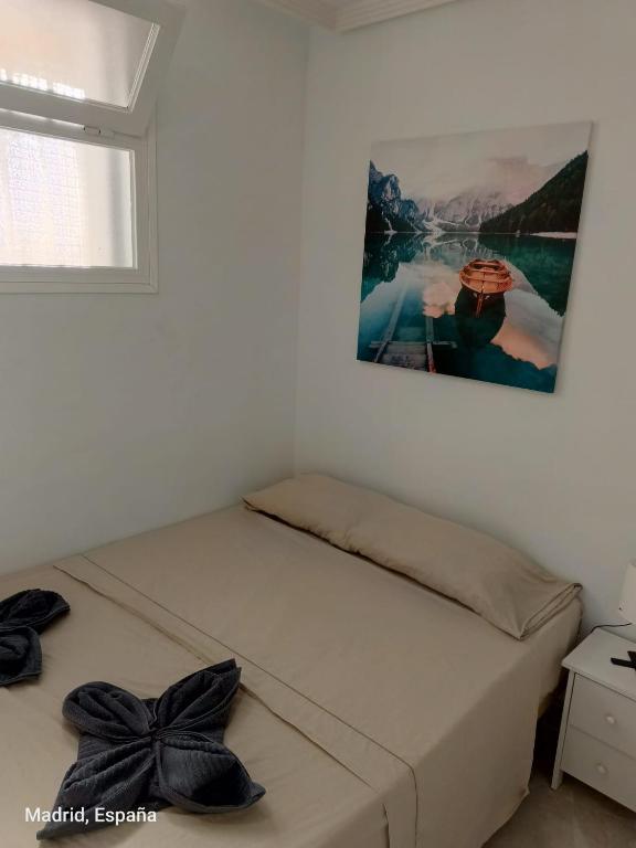 Postel nebo postele na pokoji v ubytování Hospedaje La Campana