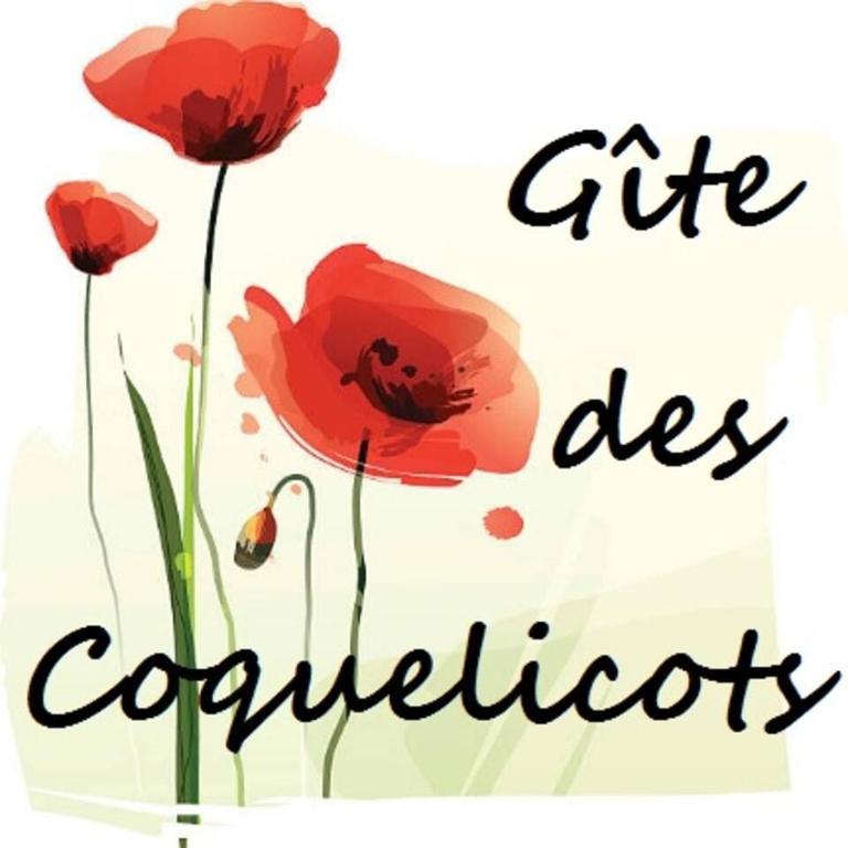 une image d'un coquelicot avec les mots cite utilise des confédérologues dans l'établissement Gite de Coquelicots avec Jacuzzi à Embreville, à Embreville