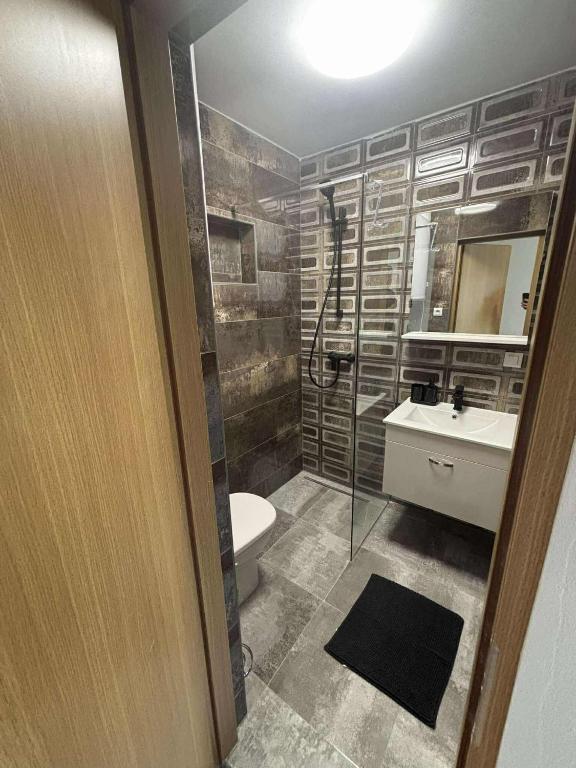 Koupelna v ubytování Soti Apartments