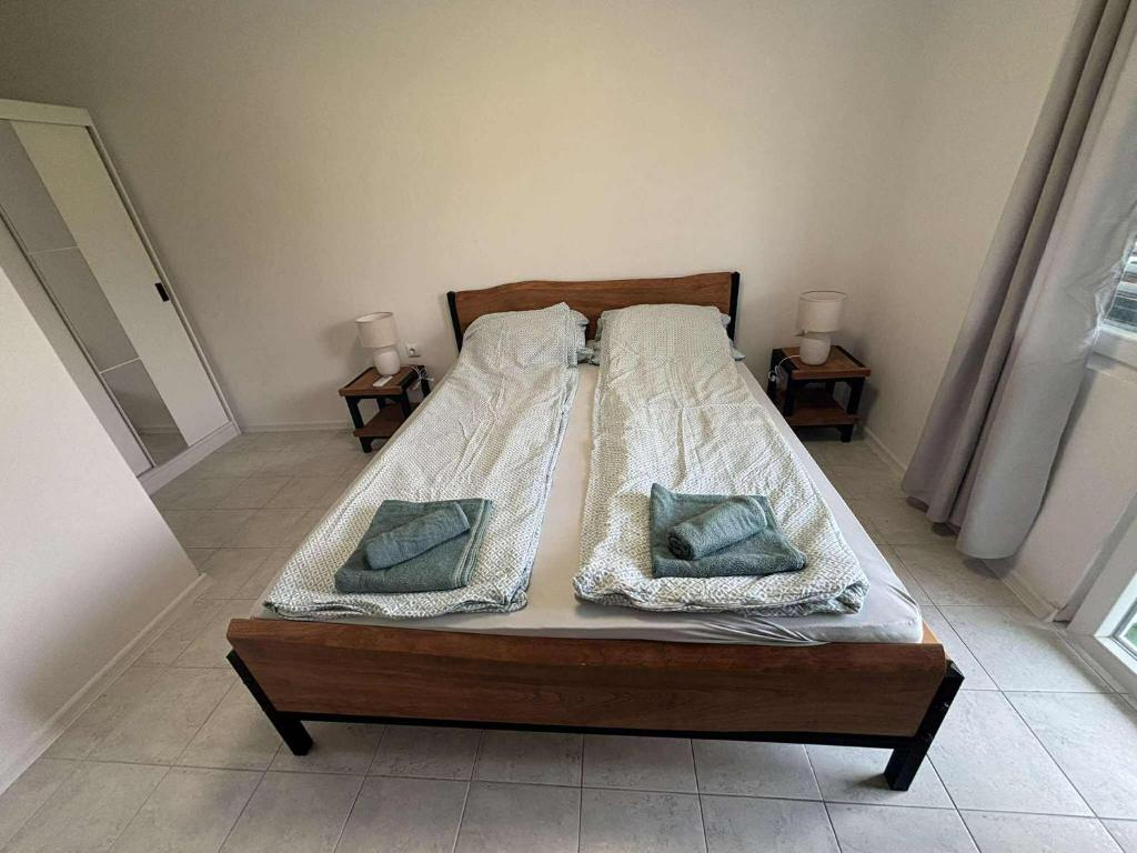 Postel nebo postele na pokoji v ubytování Soti Apartments