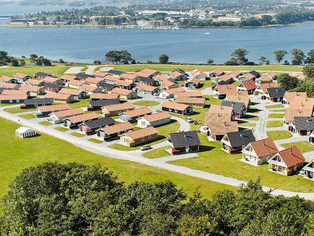 an aerial view of a housing estate next to the water at 6 person holiday home on a holiday park in Gråsten in Gråsten