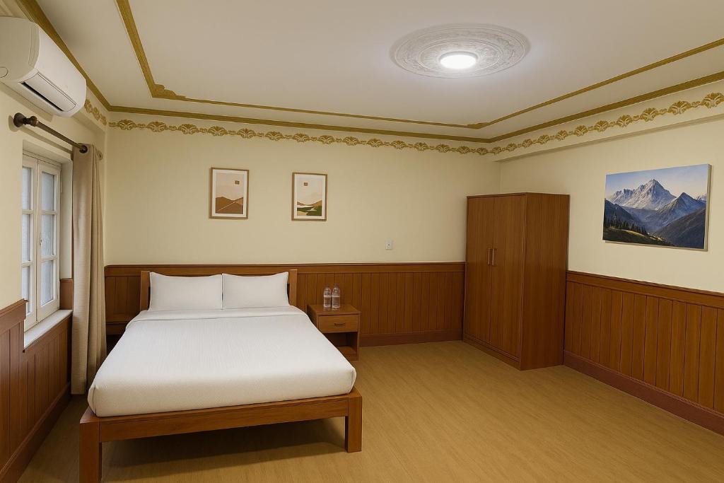 Postel nebo postele na pokoji v ubytování Hotel Suva