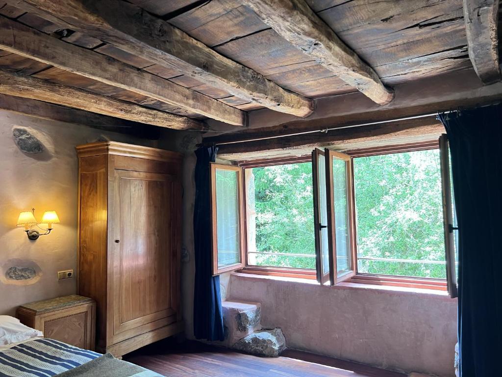 Postel nebo postele na pokoji v ubytování Casa Rural Ecológica Kaaño Etxea
