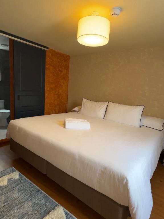 Postel nebo postele na pokoji v ubytování Hotel Casa Agave