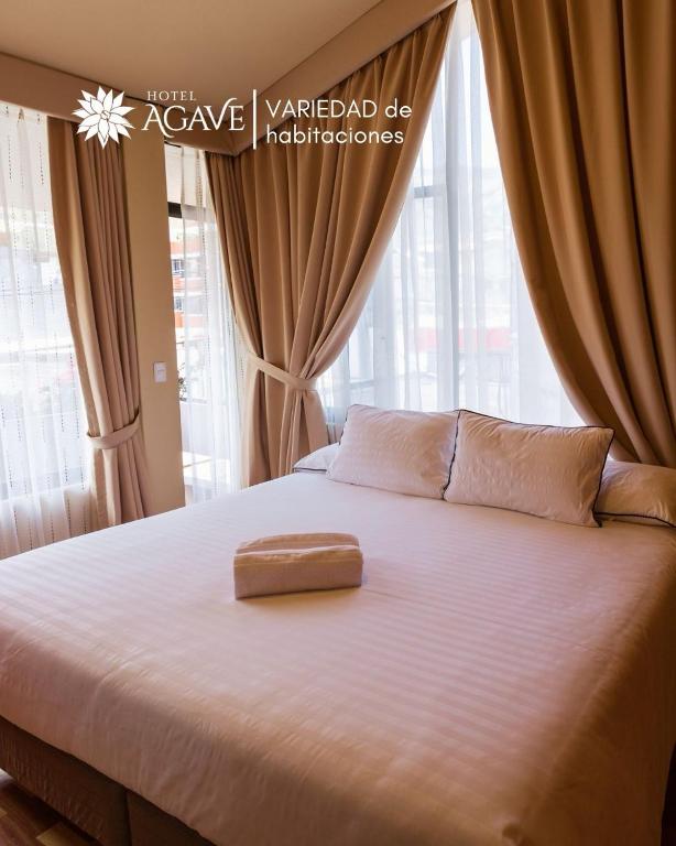 Postel nebo postele na pokoji v ubytování Hotel Casa Agave