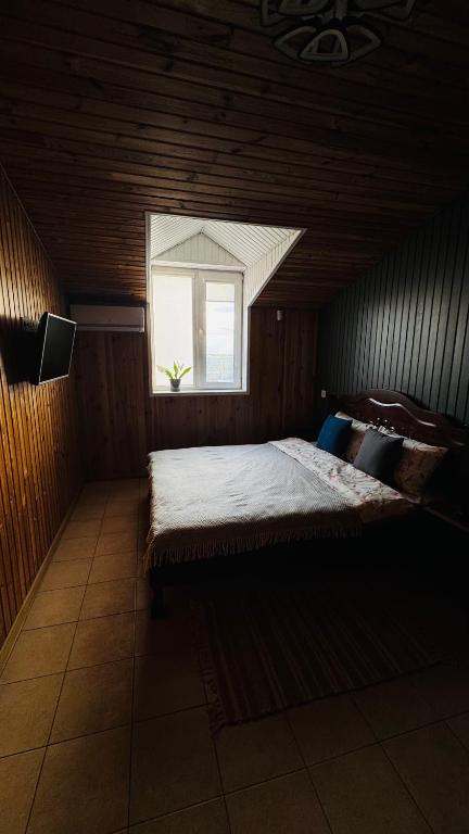 Postel nebo postele na pokoji v ubytování Olimpia Hotel&Spa