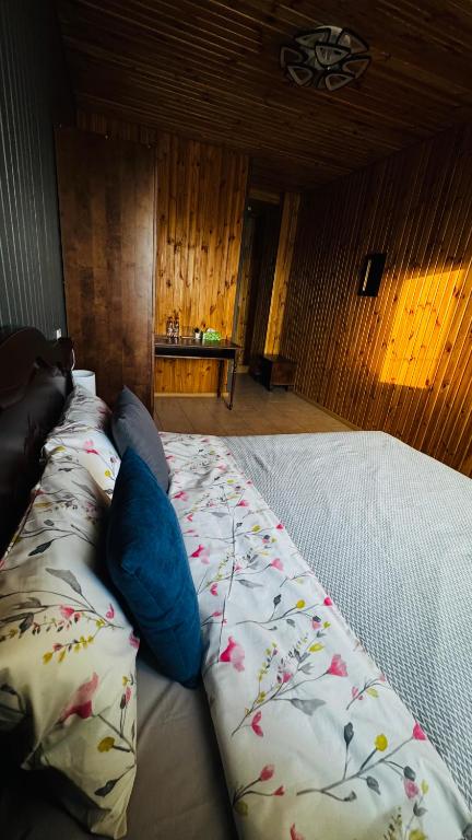 Postel nebo postele na pokoji v ubytování Olimpia Hotel&Spa