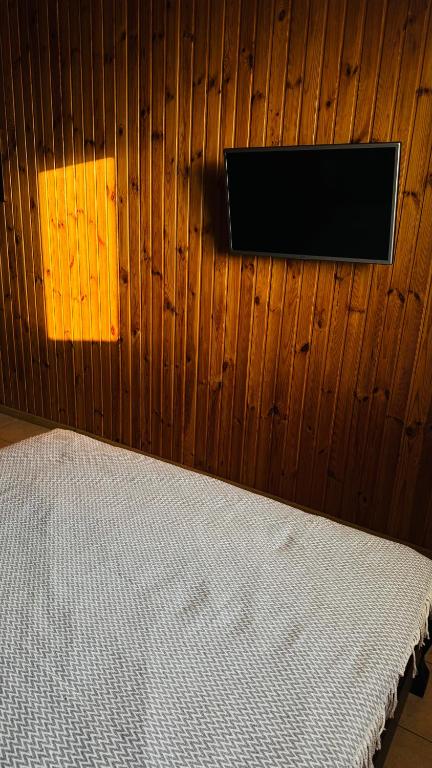 Postel nebo postele na pokoji v ubytování Olimpia Hotel&Spa