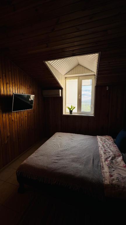Postel nebo postele na pokoji v ubytování Olimpia Hotel&Spa