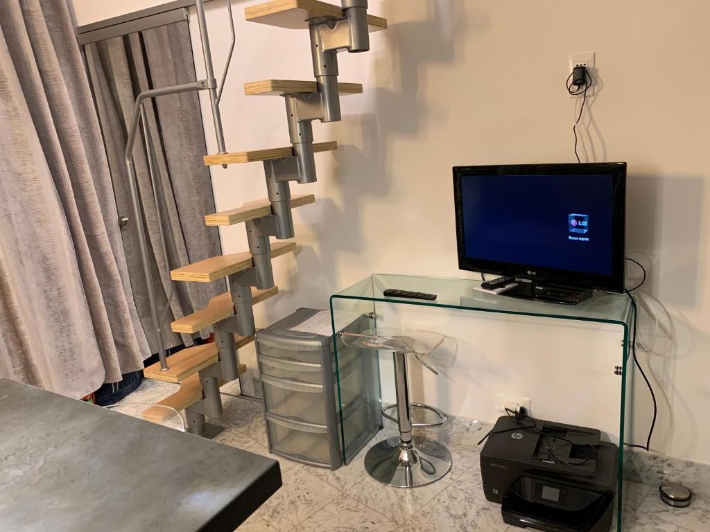 TV a/nebo společenská místnost v ubytování Monte-Carlo