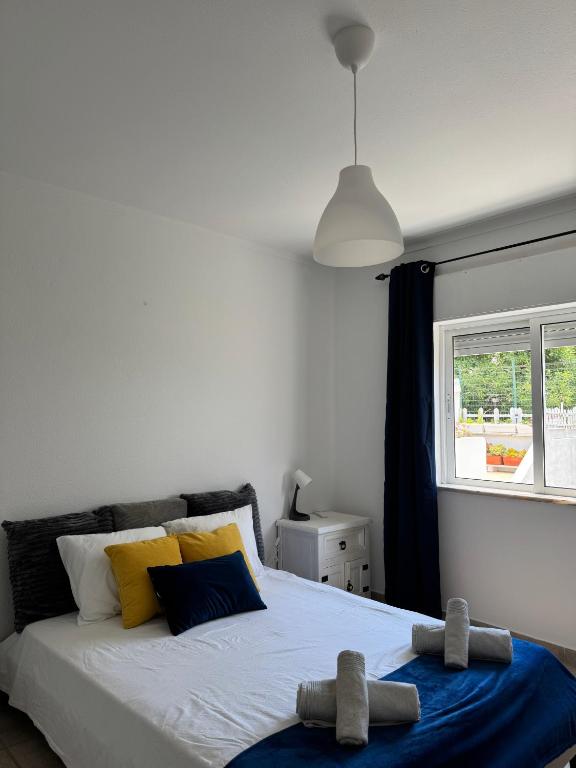 Ένα ή περισσότερα κρεβάτια σε δωμάτιο στο Azul Apartment