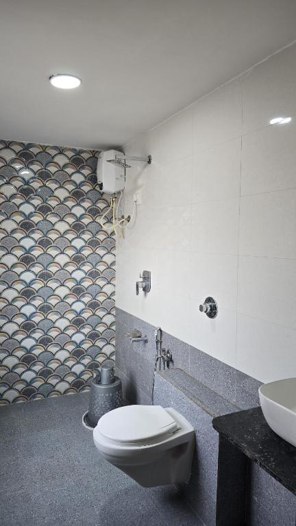 Koupelna v ubytování Gokul Guest House