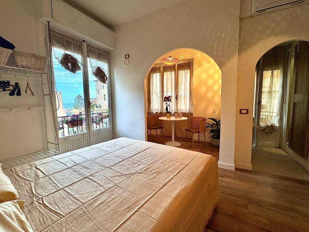 Postel nebo postele na pokoji v ubytování Il Vicolo B&B GIUBILEO