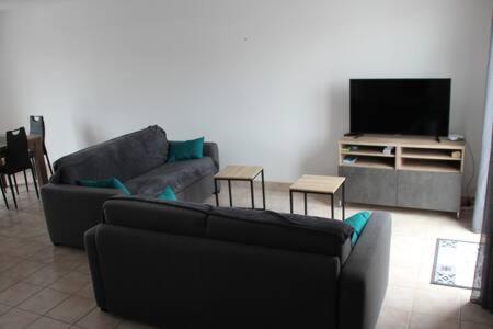 TV a/nebo společenská místnost v ubytování Maison familiale Ile d'Oléron