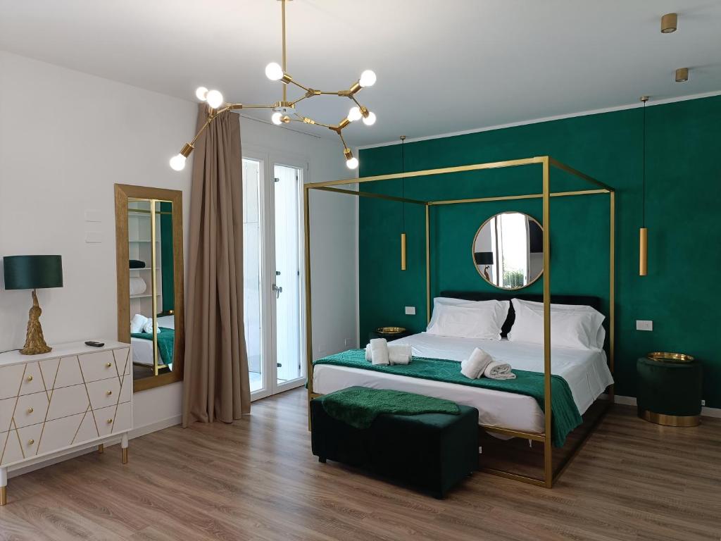 Posteľ alebo postele v izbe v ubytovaní Residence Le Aromatiche