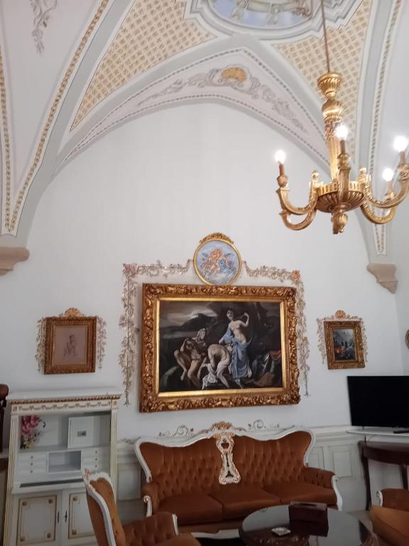 TV a/nebo společenská místnost v ubytování Casa del Conte