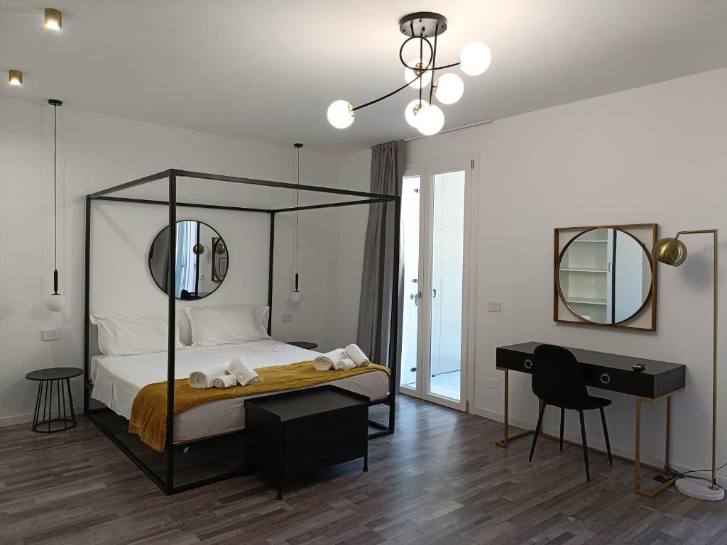 Posteľ alebo postele v izbe v ubytovaní Residence Le Aromatiche