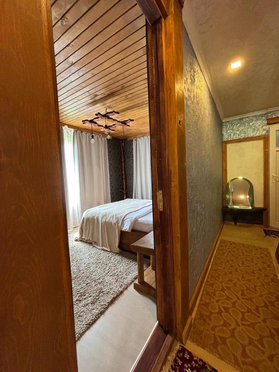 Postel nebo postele na pokoji v ubytování Guest House Shuan
