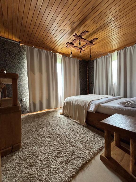 Postel nebo postele na pokoji v ubytování Guest House Shuan