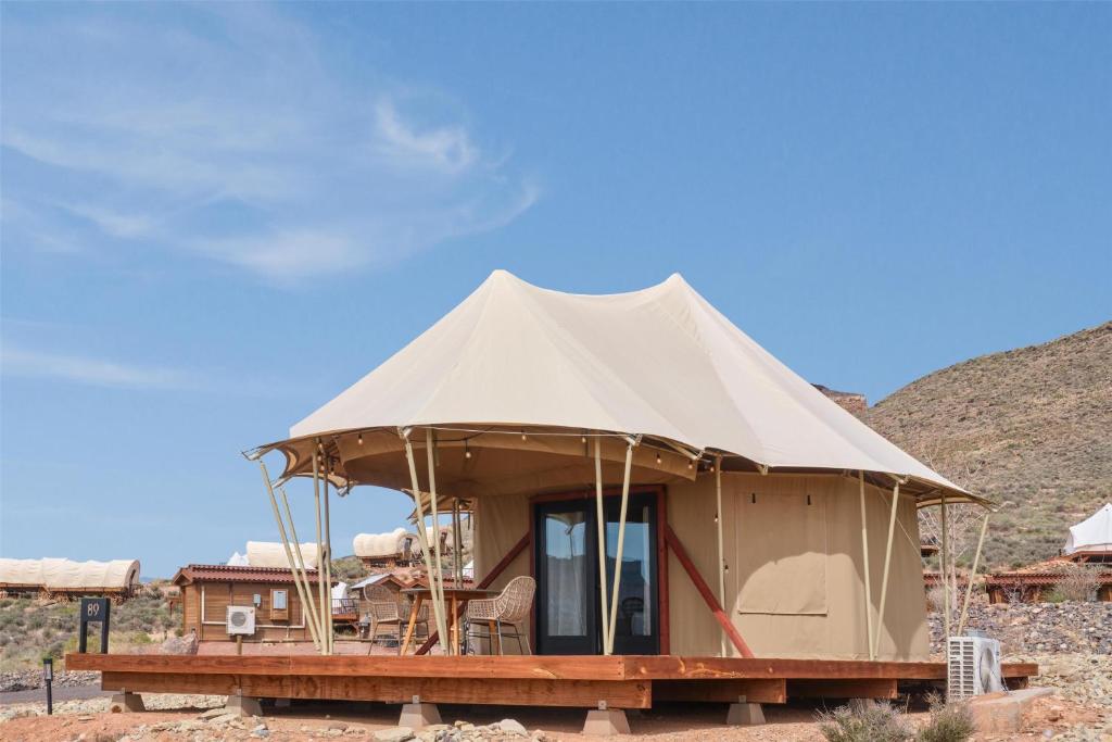 a tent in the middle of the desert at Zion Wildflower Resort in Virgin