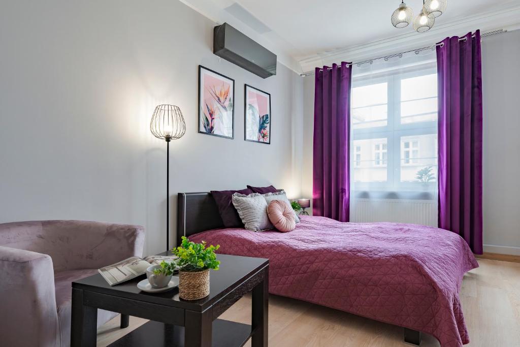 Posteľ alebo postele v izbe v ubytovaní Amber Apartments