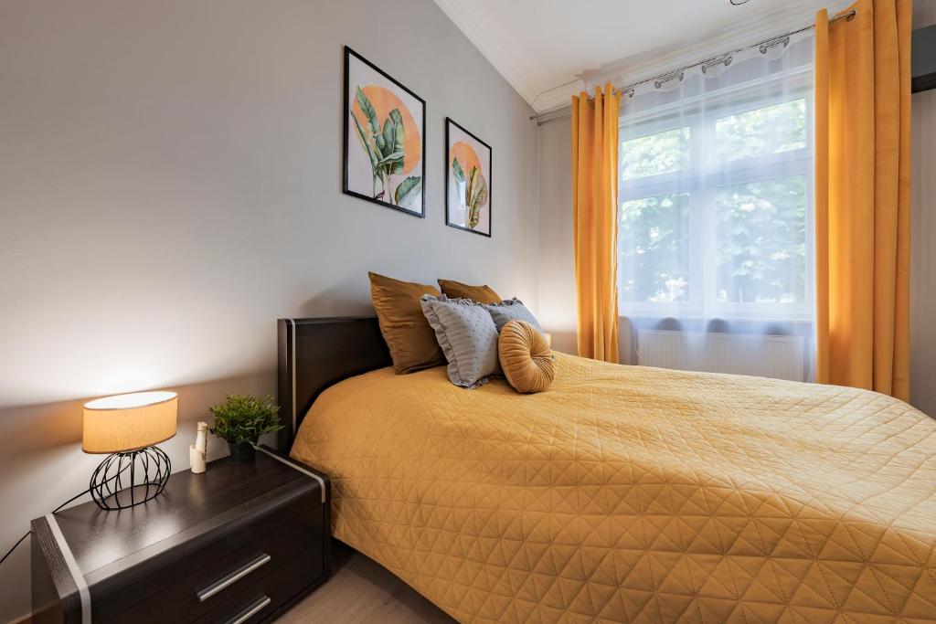 Posteľ alebo postele v izbe v ubytovaní Amber Apartments