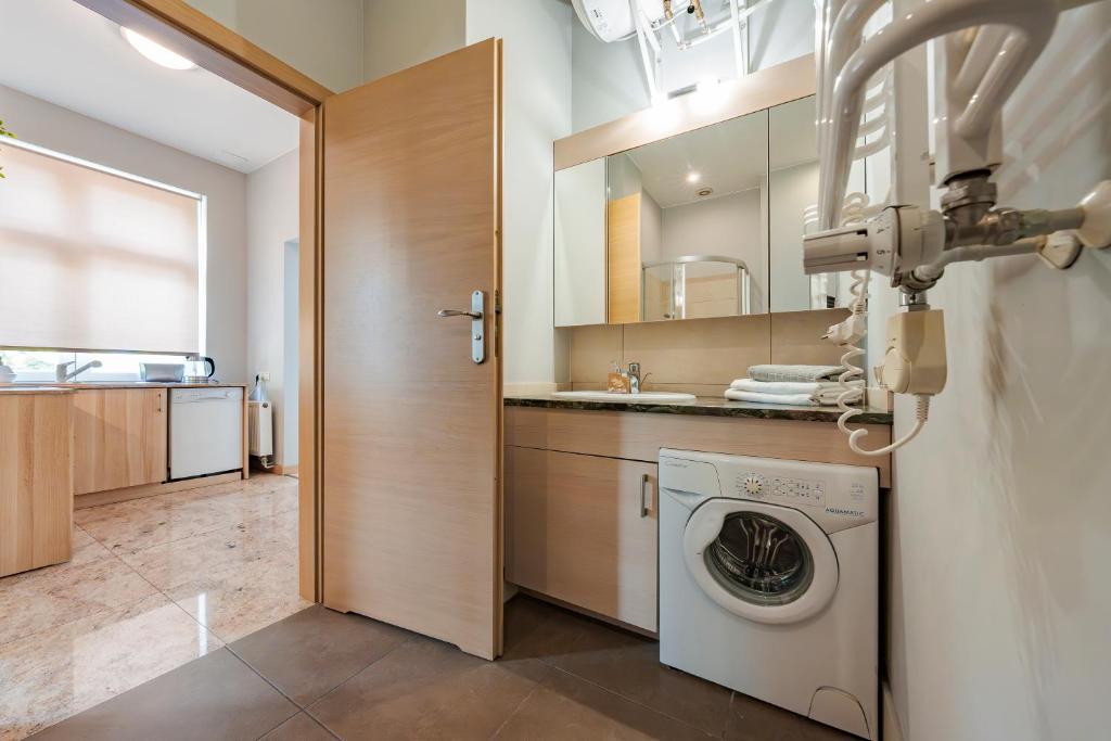 Kuchyňa alebo kuchynka v ubytovaní Amber Apartments