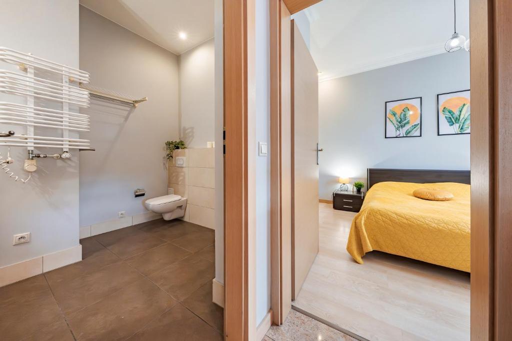 Posteľ alebo postele v izbe v ubytovaní Amber Apartments