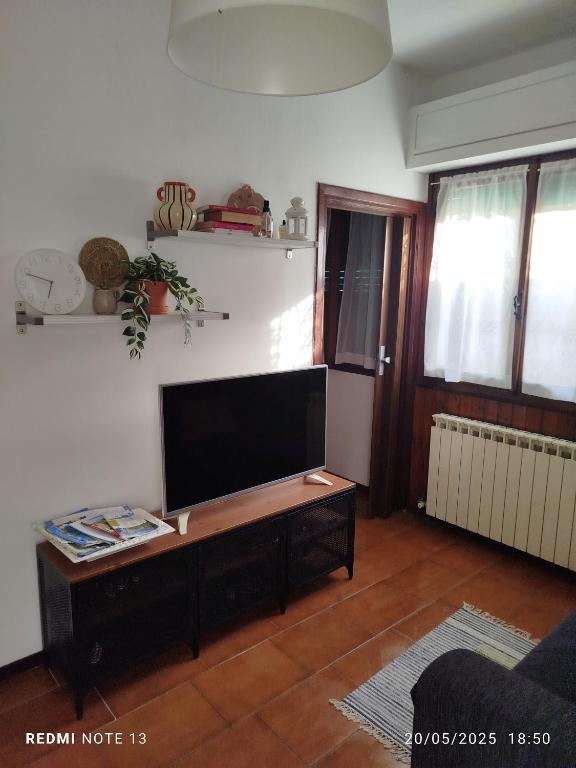 TV a/nebo společenská místnost v ubytování Casa Lilly