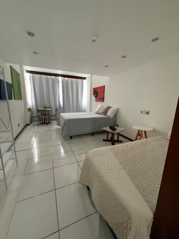 Postel nebo postele na pokoji v ubytování Hotel sol vitória Marina vista corredor da Vitória