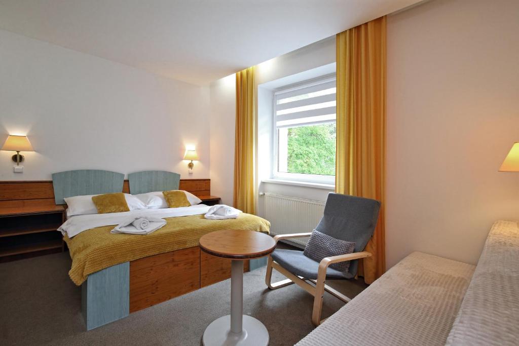 Postel nebo postele na pokoji v ubytování Interhotel Montana