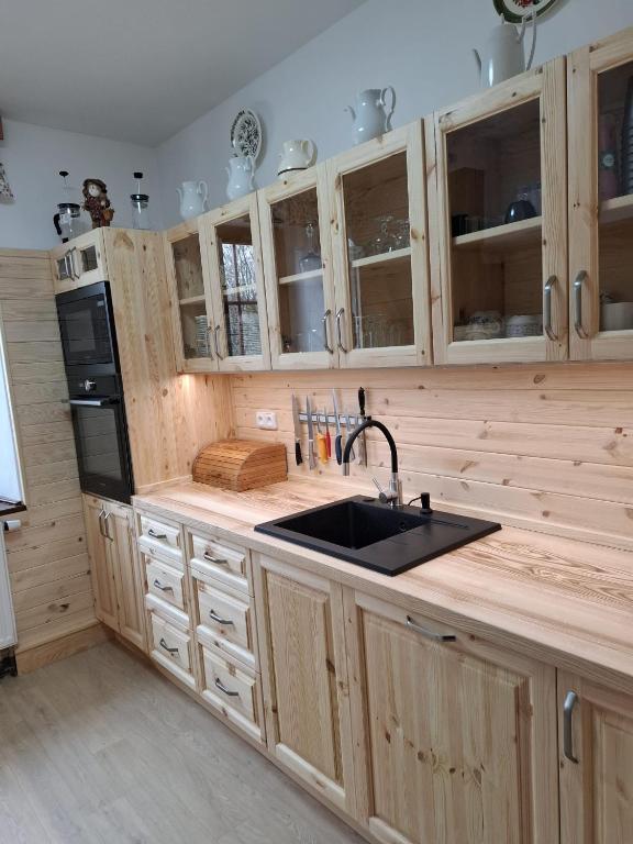 Kuchyň nebo kuchyňský kout v ubytování Chata Severka s Wellness