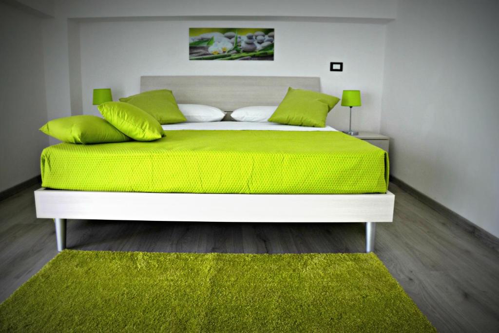 Кровать или кровати в номере Naxos Apartments