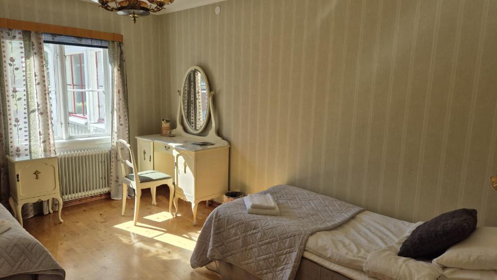 Postel nebo postele na pokoji v ubytování Pensionat Klåvasten