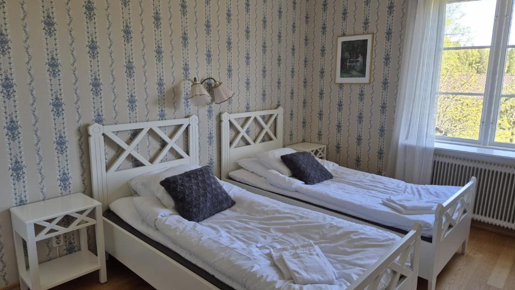 Postel nebo postele na pokoji v ubytování Pensionat Klåvasten