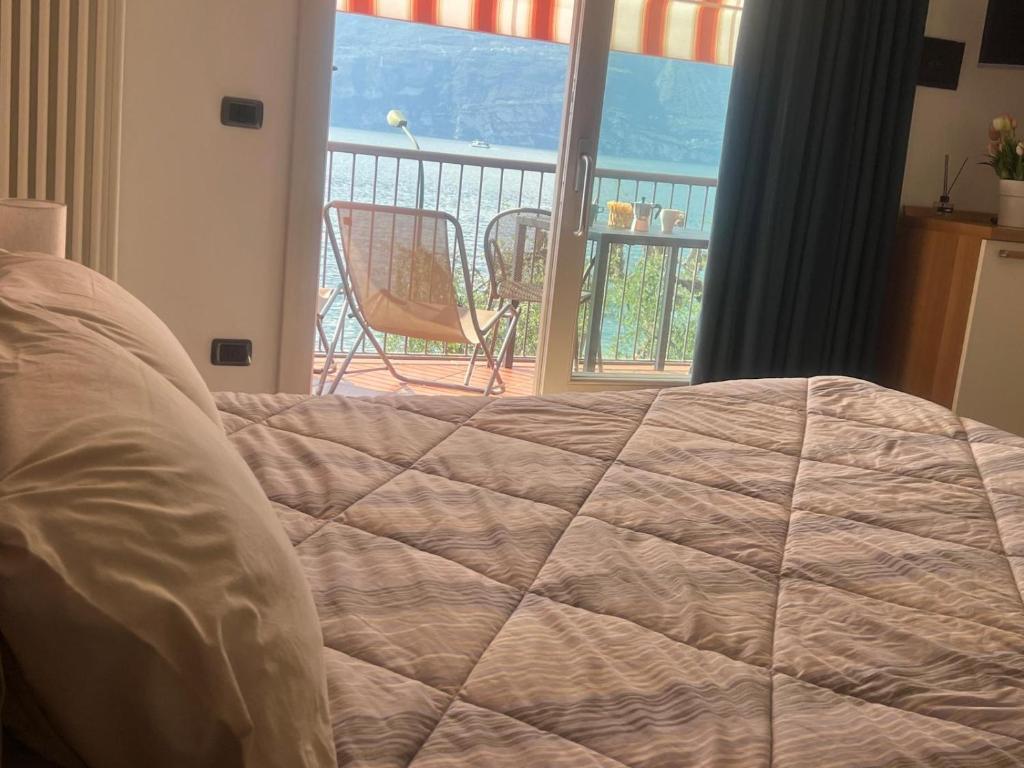 A bed or beds in a room at Residence Villa al Lido