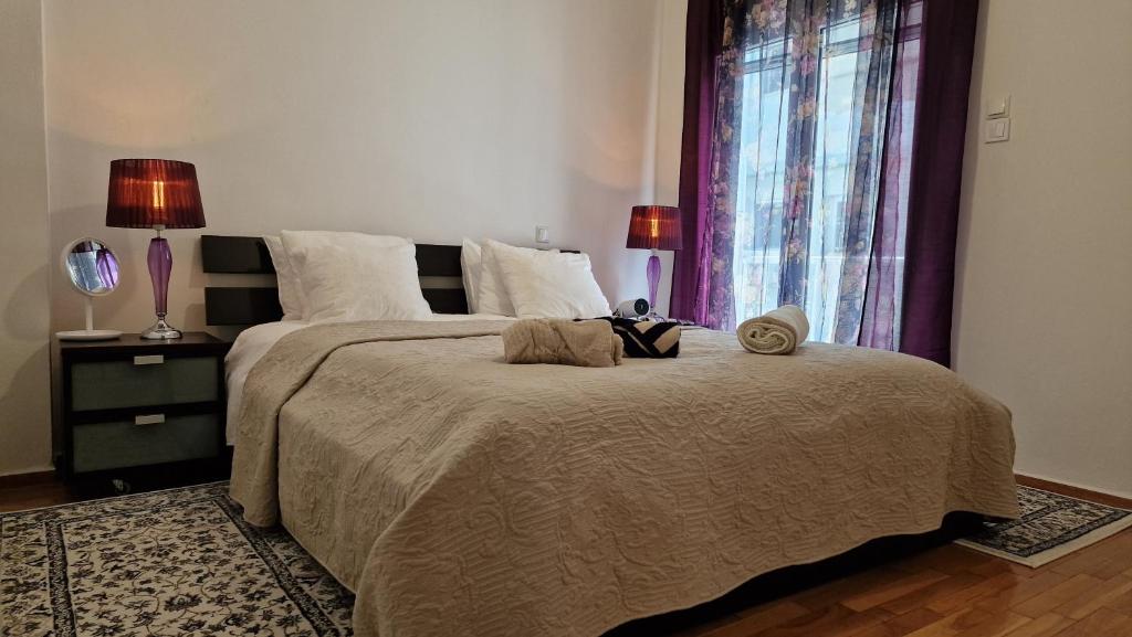Postel nebo postele na pokoji v ubytování Modern apartment in Neo Faliro