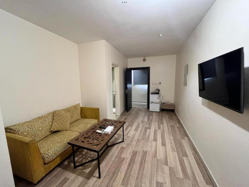 TV a/nebo společenská místnost v ubytování شقق السلامة العائلية - Al Salamh Family Apartments