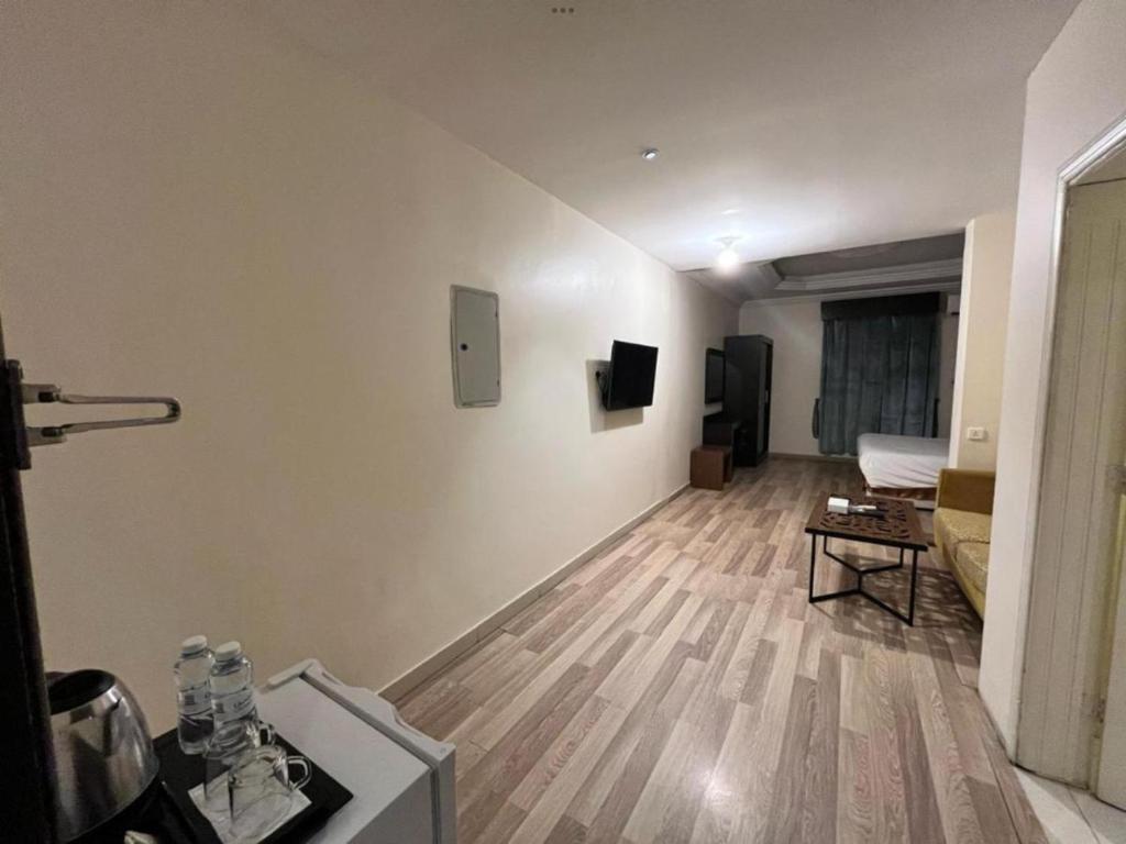 TV a/nebo společenská místnost v ubytování شقق السلامة العائلية - Al Salamh Family Apartments