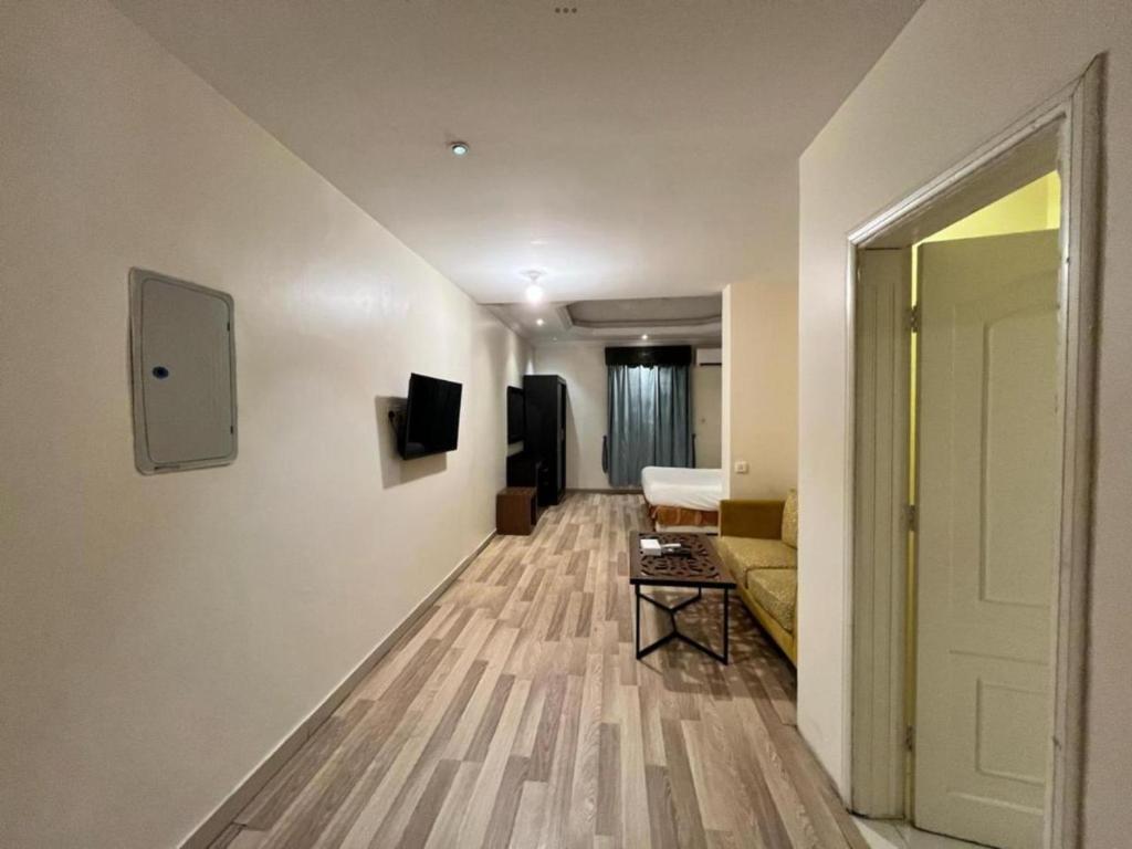 TV a/nebo společenská místnost v ubytování شقق السلامة العائلية - Al Salamh Family Apartments